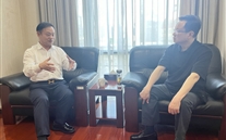 市人大常委會屈謙副主任聽取張龍義董事長工作匯報